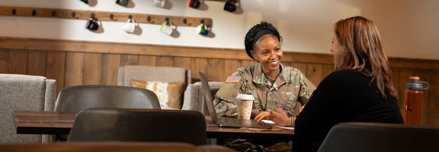 Veteran in uniform in a coffee shop